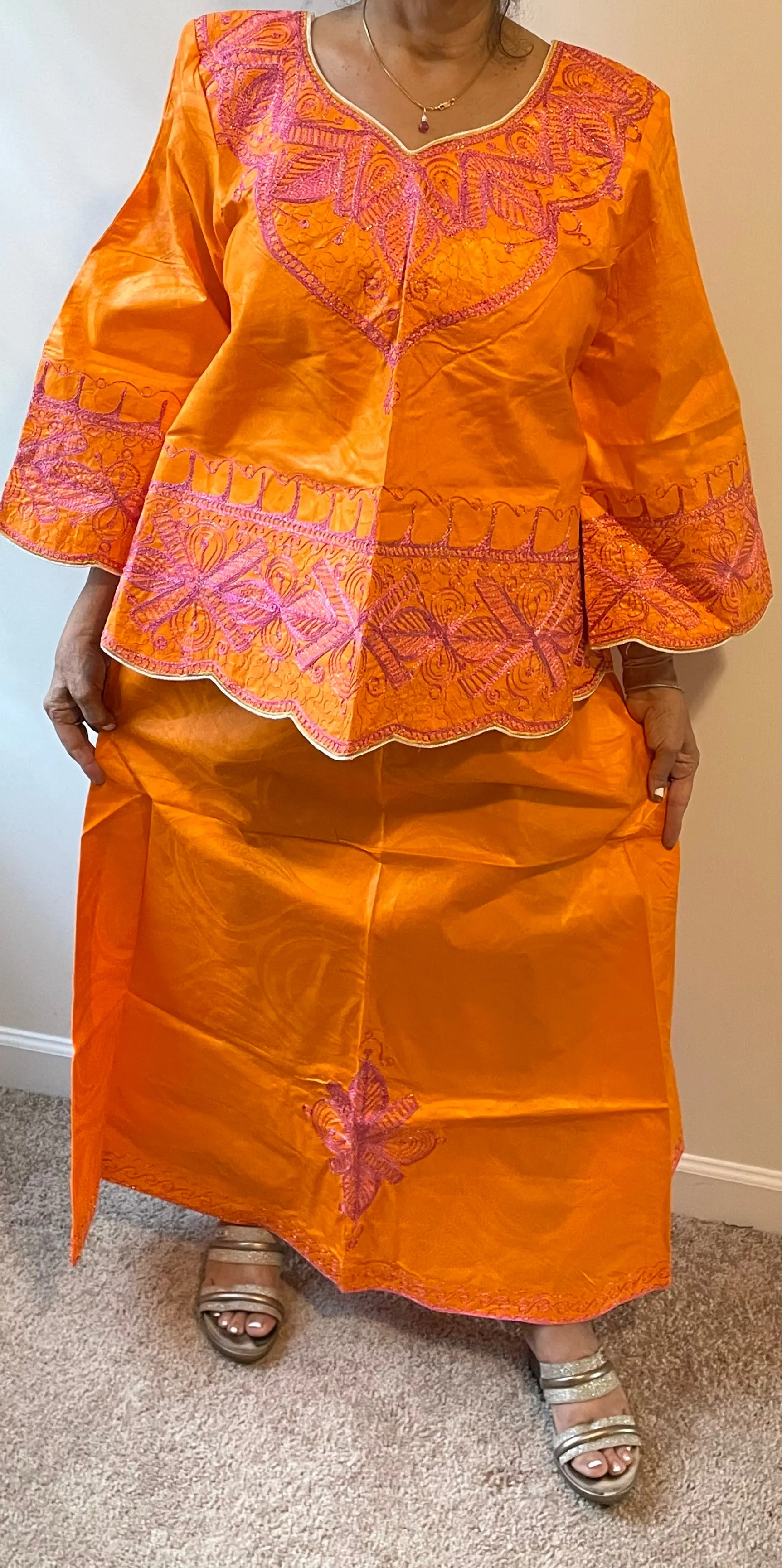 African Skirt Set made in Ghana has an embroidery in Pink color.