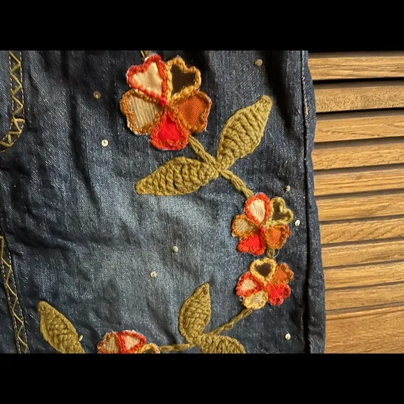 BEBE floral embroidered denim mini skirt
