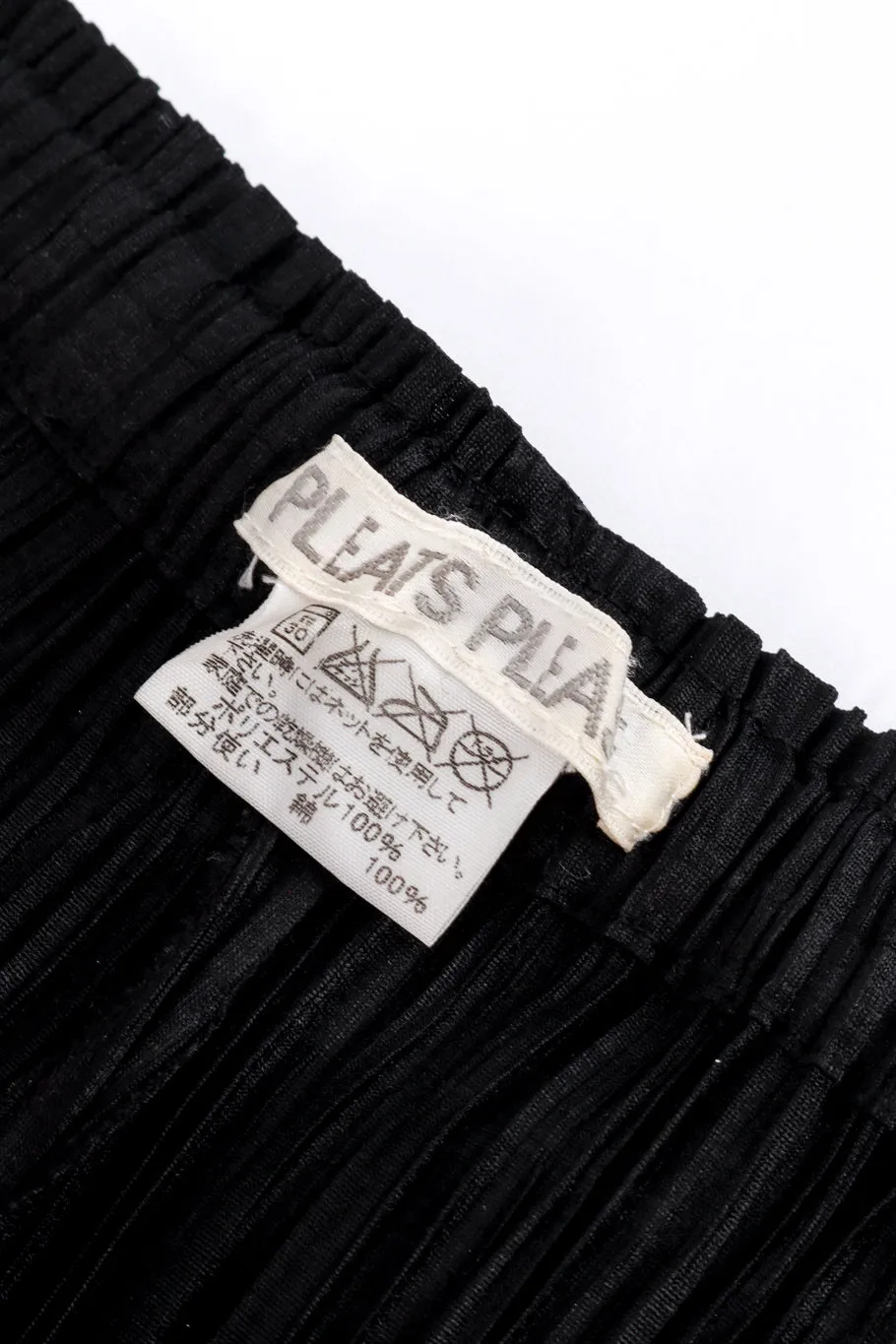 Plissé Bell Bottom Capri Pants
